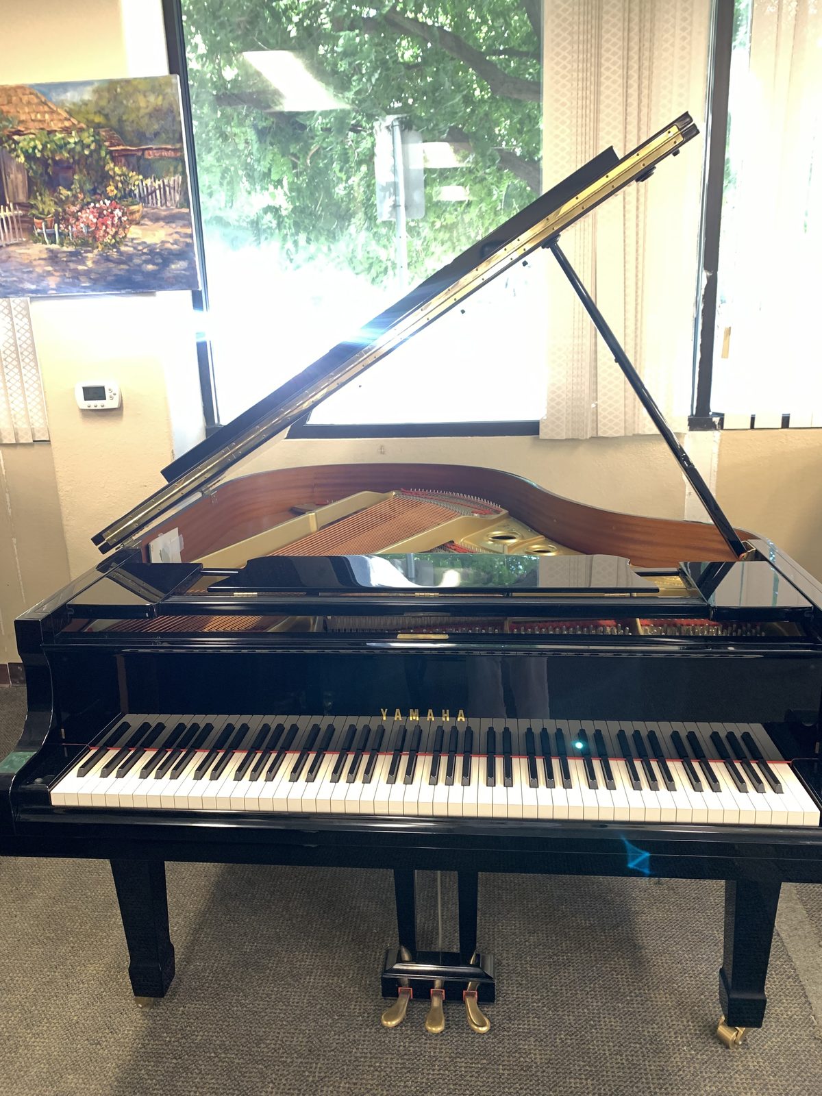 Yamaha G2B baby grand piano, polished ebony, in the CholeZ Piano showroom