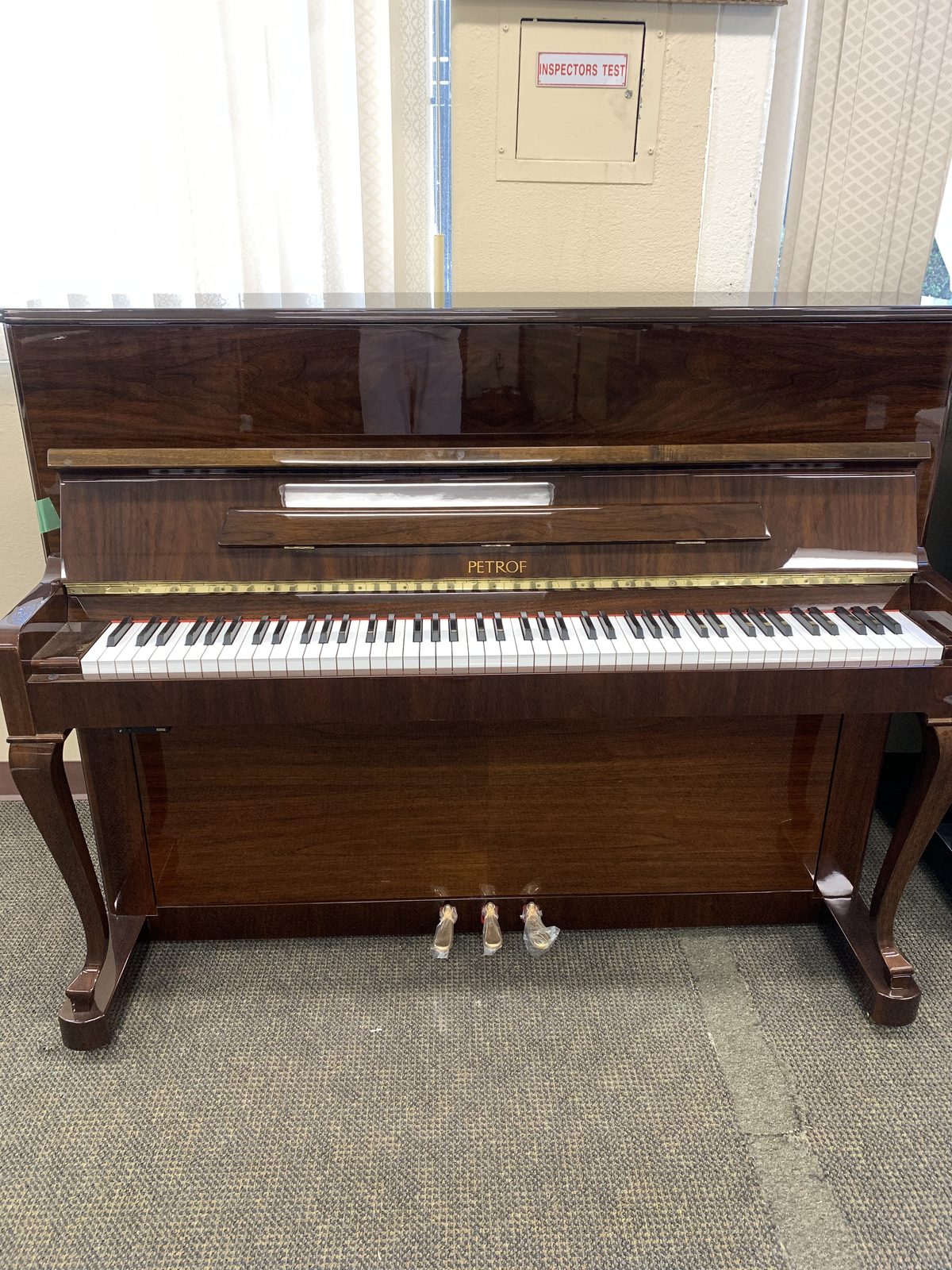 Petrof UP126 upright piano in polished walnut