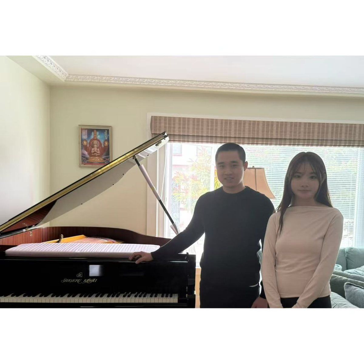 Owner delivering a Shigeru Kawai grand piano to a customer's home